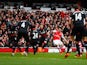Hector Bellerin of Arsenal scores the opening goal during the Barclays Premier League match between Arsenal and Liverpool at Emirates Stadium on April 4, 2015