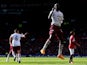 Christian Benteke of Aston Villa celebrates after scoring his team's first goal during the Barclays Premier League match between Manchester United and Aston Villa at Old Trafford on April 4, 2015