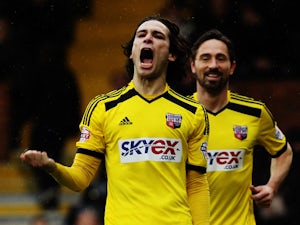 Jota of Brentford celebrates scoring his sides fourth goal during the Sky Bet Championship match between Fulham and Brentford at Craven Cottage on April 3, 2015