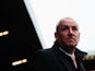 Mark Warburton the Brentford manager looks on before the Sky Bet Championship match between Fulham and Brentford at Craven Cottage on April 3, 2015