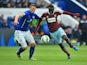 Cheikhou Kouyate of West Ham and Robert Huth of Leicester City compete for the ball during the Barclays Premier league match Leicester City and West Ham United at The King Power Stadium on April 4, 2015
