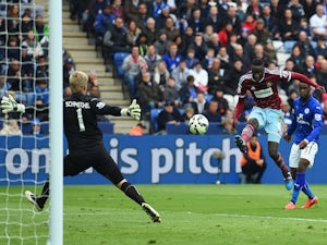 Cheikhou Kouyate of West Ham scores their first goal past Kasper Schmeichel of Leicester City during the Barclays Premier league match Leicester City and West Ham United at The King Power Stadium on April 4, 2015