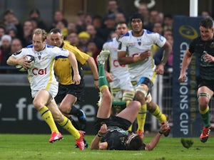 Nick Abendanon of Clermont Auvergne breaks clear to score a try during the European Rugby Champions Cup quarter final match between Clermont Auvergne and Northampton Saints at the Stade Marcel Michelin on April 4, 2015