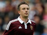 Danny Wilson of Heart of Midlothian in action during the pre-season friendly at Tynecastle Stadium on July 18, 2014