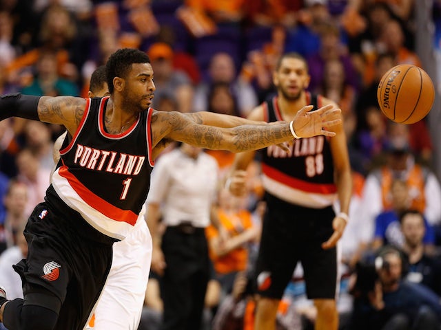 Dorell Wright #1 of the Portland Trail Blazers reaches for a loose ball during the first half of the NBA game against the Phoenix Suns at US Airways Center on January 21, 2015