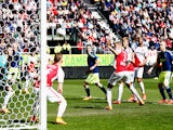Ramon Leeuwin #3 of Utrecht can only watch as the ball comes off him to score an own goal during the Dutch Eredivisie match between FC Utrecht and Ajax Amsterdam held at Stadion Galgenwaard on April 5, 2015