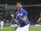 Graziano Pelle of Italy celebrates after scoring the opening goal during the international friendly match beteween Italy and England at Juventus Arena on March 31, 2015Graziano Pelle of Italy celebrates after scoring the opening goal during the internatio
