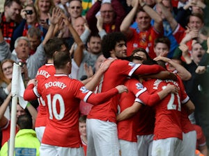 Rooney, Herrera inspire United to victory