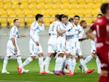 Besart Berisha and Fahid Ben Khalfallah of the Victory celebrate the goal of Gui Finkler during the round 24 A-League match between the Wellington Phoenix and Melbourne City FC at Westpac Stadium on April 5, 2015