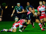 Connacht full back Mils Muliaina is stopped by Jonny May (l) and James Hook of Gloucester during the European Rugby Challenge Cup Quarter Final match between Gloucester Rugby and Connacht Rugby at Kingsholm Stadium on April 3, 2015