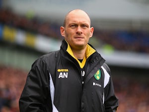 Manager Alex Neil of Norwich looks on during the Sky Bet Championship match between Brighton & Hove Albion and Norwich City at Amex Stadium on April 3, 2015
