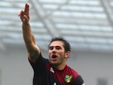 Bradley Johnson of Norwich celebrates scoring the opening goal during the Sky Bet Championship match between Brighton & Hove Albion and Norwich City at Amex Stadium on April 3, 2015
