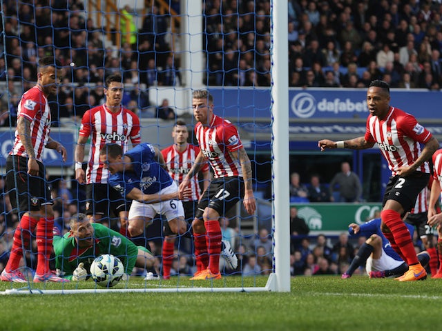 Phil Jagielka of Everton scores the opening goal during the Barclays Premier League match between Everton and Southampton at Goodison Park on April 4, 2015