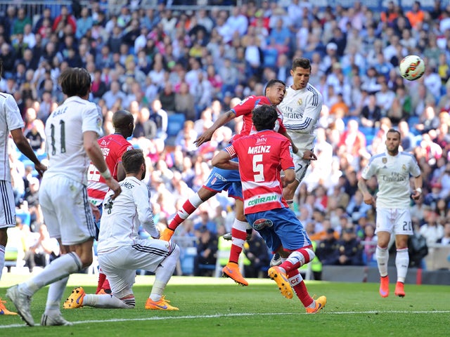 Cristiano Ronaldo of Real Madrid CF scores his team's 9th goal during the La Liga match between Real Madrid CF and Granada CF at Estadio Santiago Bernabeu on April 5, 2015 