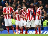Charlie Adam of Stoke City celebrates with team-mates after scoring his team's first goal during the Barclays Premier League match between Chelsea and Stoke City at Stamford Bridge on April 4, 2015