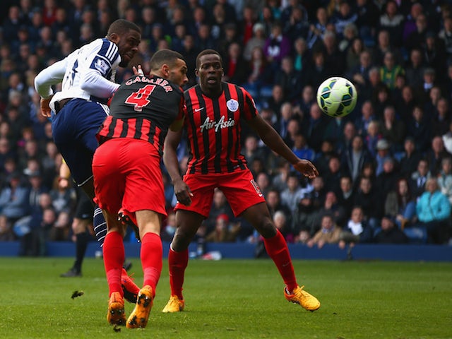 Victor Anichebe of West Brom scores their first goal during the Barclays Premier league match West Bromwich Albion and Queens Park Rangers at The Hawthorns on April 4, 2015