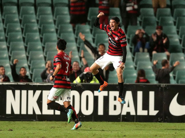 Yojiro Takahagi of the Wanderers celebrates scoring a goal during the round 24 A-League match between the Western Sydney Wanderers and Melbourne City FC at Pirtek Stadium on April 3, 2015