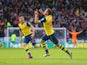 Aaron Ramsey of Arsenal celebrates scoring the opening goal with Hector Bellerin of Arsenal during the Barclays Premier League match between Burnley and Arsenal at Turf Moor on April 11, 2015