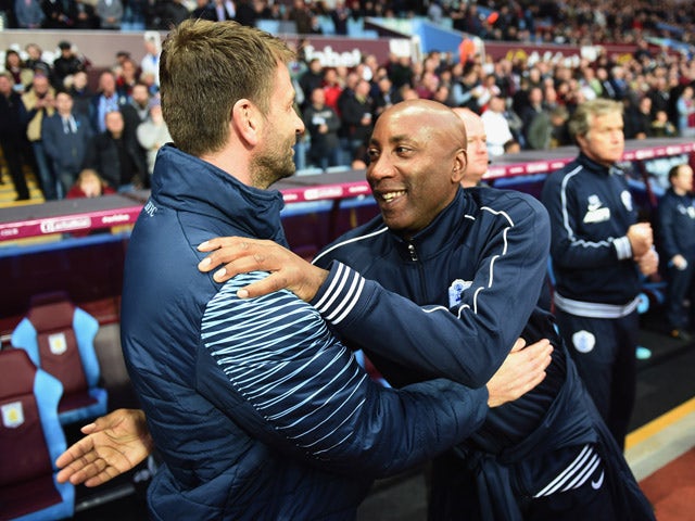 Tim Sherwood manager of Aston Villa and Chris Ramsey manager of QPR embrace prior to the Barclays Premier League match between Aston Villa and Queens Park Rangers at Villa Park on April 7, 2015