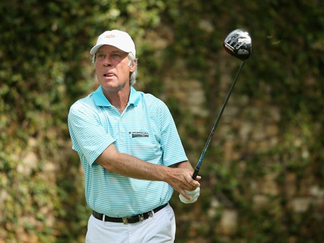 Ben Crenshaw of the United States hits a tee shot on the second tee during the second round of the 2014 Masters Tournament at Augusta National Golf Club on April 11, 2014