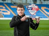 Shrewsbury Town's Bobby Grant poses with his Player of the Month award for March 2015