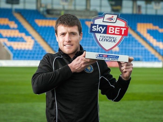 Shrewsbury Town's Bobby Grant poses with his Player of the Month award for March 2015