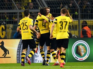 Dortmund battle back to reach DFB-Pokal semis