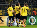 Dortmund's player celebrate during the German Football Cup DFB Pokal quarter-final match between Borussia Dortmund and 1899 Hoffenheim in Dortmund, western Germany, on April 7, 2015