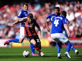 Ryan Fraser of AFC Bournemouth takes on Paul Robinson of Birmingham City during the Sky Bet Championship match between AFC Bournemouth and Birmingham City at Goldsands Stadium on April 6, 2015