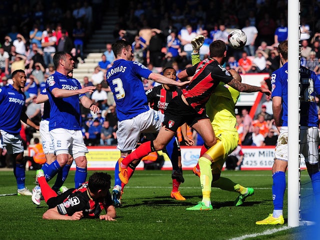 Steve Cook of AFC Bournemouth scores his side's first goal during the Sky Bet Championship match between AFC Bournemouth and Birmingham City at Goldsands Stadium on April 6, 2015