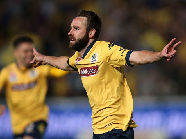Josh Rose of the Mariners celebrates a goal during the round 25 A-League match between the Central Coast Mariners and the Western Sydney Wanderers at Central Coast Stadium on April 11, 2015