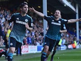 Chelsea's Spanish midfielder Cesc Fabregas celebrates with Chelsea's Serbian defender Branislav Ivanovic after scoring their goal during the English Premier League football match between Queens Park Rangers and Chelsea at Loftus Road Stadium in London on 