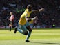 Crystal Palace's French-born Congolese midfielder Yannick Bolasie celebrates scoring their second goal during the English Premier League football match between Sunderland and Crystal Palace at the Stadium of Light in Sunderland, northeast England, on Apri