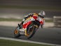Dani Pedrosa of Spain and Repsol Honda Team heads down a straight during the MotoGp of Qatar - Free Practice at Losail Circuit on March 27, 2015
