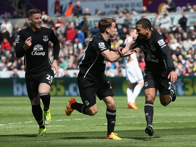 Aaron Lennon of Everton celebrates scoring the opening goal with Seamus Coleman and Ross Barkley of Everton during the Barclays Premier League match between Swansea City and Everton at Liberty Stadium on April 11, 2015