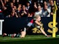 Charlie Walker of Harlequins goes over for the teams first try during the Aviva Premiership match between HarleHarlequins and Gloucester at Twickenham Stoop on April 11, 2015