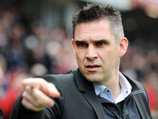 Guingamp's French head coach Jocelyn Gourvennec gestures during the French L1 football match between Guingamp and Lyon on April 4, 2015