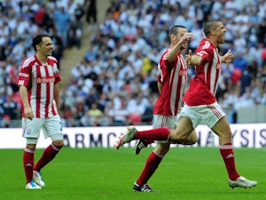 Jonathan Walters (R) of Stoke celebrates with his team scoring the fourth goal during the FA Cup sponsored by E.ON semi final match between Bolton Wanderers and Stoke City at Wembley Stadium on April 17, 2011