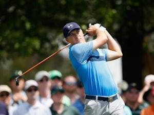 Jordan Spieth of the United States plays his tee shot on the fourth hole during the first round of the 2015 Masters Tournament at Augusta National Golf Club on April 9, 2015