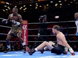 Peter Quillin knocks down Andy Lee during the Premier Boxing Champions Middleweight bout at Barclays Center on April 11, 2015