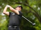 Record-breaking Mickelson retains Open lead