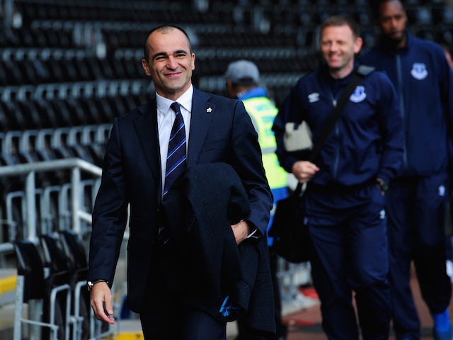 Roberto Martinez arrives at the Liberty with his players ahead of Everton's match with Swansea on April 11, 2015