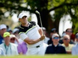 Rory McIlroy of Northern Ireland watches his tee shot on the fourth hole during the first round of the 2015 Masters Tournament at Augusta National Golf Club on April 9, 2015
