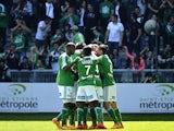 Saint-Etienne players celebrate after French midfielder Franck Tabanou scored a goal during the French L1 football match Saint-Etienne (ASSE) vs Nantes (FCN) on April 12, 2015