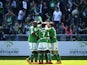 Saint-Etienne players celebrate after French midfielder Franck Tabanou scored a goal during the French L1 football match Saint-Etienne (ASSE) vs Nantes (FCN) on April 12, 2015