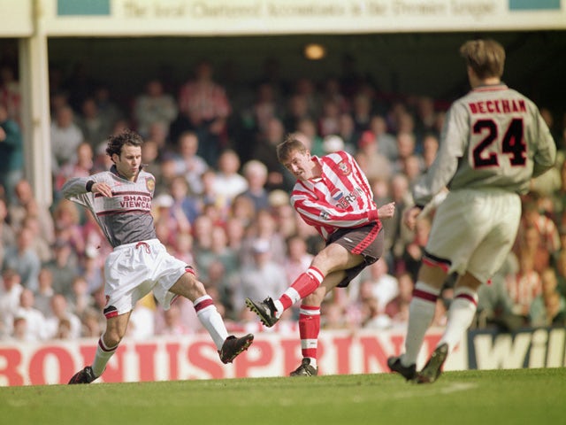 Matthew Le Tissier of Southampton shoots at goal as Ryan Giggs of Manchester United makes a challenge during the FA Carling Premiership match between Southampton and Manchester United held on April 13, 1996