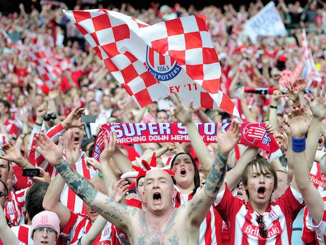 Stoke City fans celebrate their team winning at the final whistle during the FA Cup sponsored by E.ON semi final match between Bolton Wanderers and Stoke City at Wembley Stadium on April 17, 2011