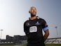 Tymal Mills poses for a portrait during the Sussex County Cricket Photocall at BrightonandHoveJobs.com County Ground on April 9, 2015