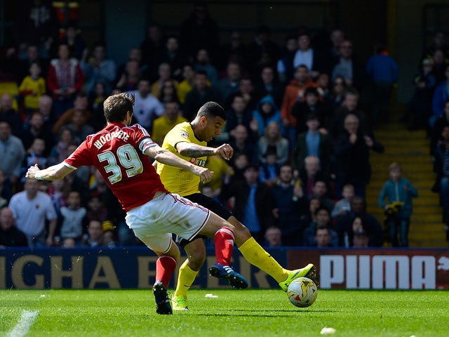Troy Deeney Watford FC scores the first goal during the Sky Bet Championship match between Watford and Middlesbrough at Vicarage Road on April 6, 2015
