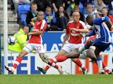 Wigan Athletic's French midfielder Charles N'Zogbia scores his teams third goal during the English Premier league football match against Arsenal at the DW Stadium, Wigan, north-west, England, on April 18, 2010
